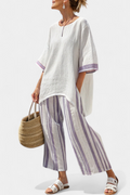 Celina | Women's set with a loose-fitting top and striped trousers